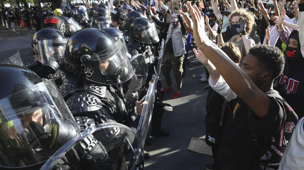 On June 1, 2020, law enforcement officers cleared protesters from Lafayette Square near the White House using tear gas and other tactics to allow President Donald Trump to walk to St. John's Episcopal Church to pose for a photo while holding a Bible. File Photo by Tasos Katopodis/UPI