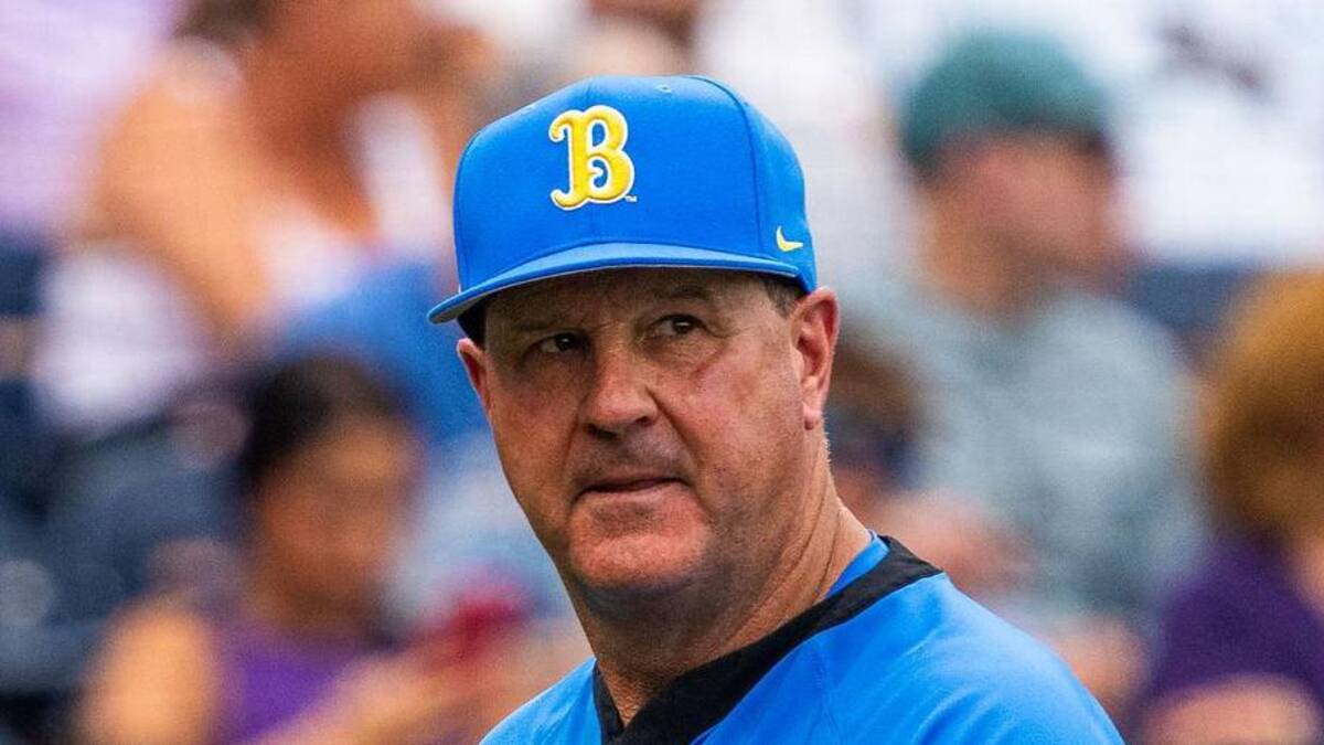  Jun 16, 2025; Omaha, Neb, USA; UCLA Bruins head coach John Savage walks off the field before the game against the LSU Tigers at Charles Schwab Field. Mandatory Credit: Dylan Widger-Imagn Images | Dylan Widger-Imagn Images 