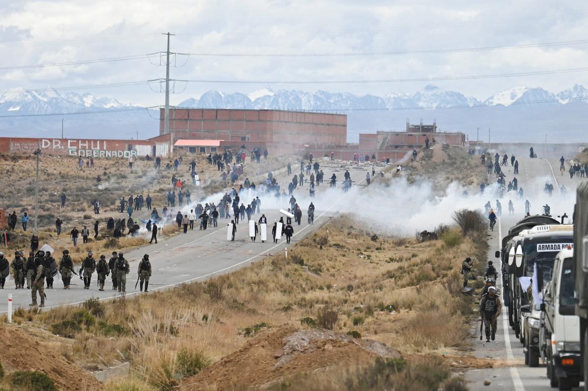 Security forces use tear gas during nationwide protests aiming to press Bolivian President Rodrigo Paz's government to roll back austerity measures and address rising costs of living, in Apacheta, Bolivia, May 23, 2026. REUTERS/Claudia Morales