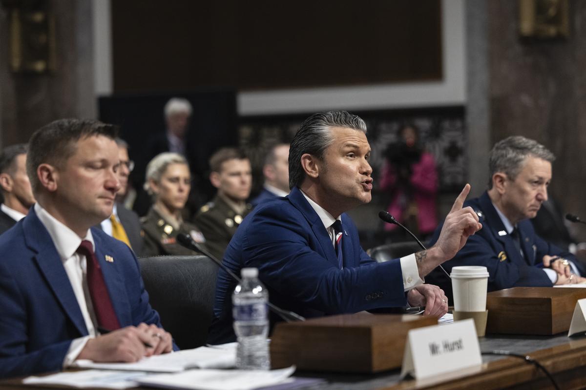 Secretary of Defense Pete Hegseth, center, and Gen. Dan Caine, right, chairman of the Joint Chiefs of Staff, testify during a Senate Armed Services Committee hearing on the department's budget request on Capitol Hill in Washington, on Thursday, April 30, 2026. (Anna Rose Layden/The New York Times)