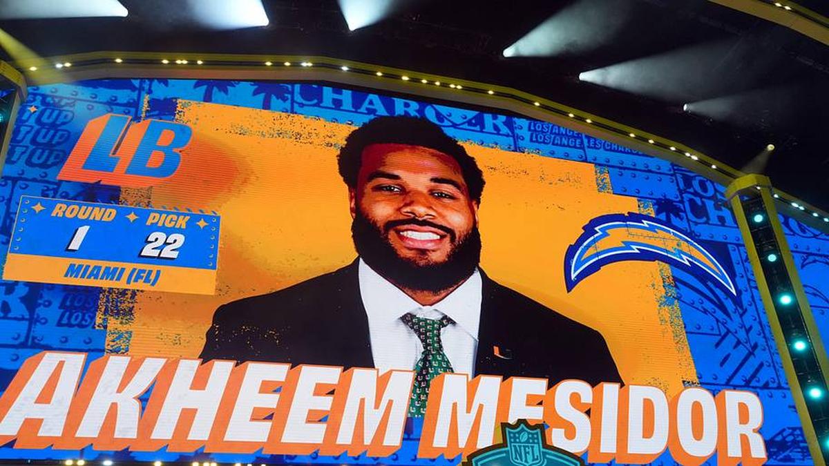  Apr 23, 2026; Pittsburgh, PA, USA; Miami Hurricanes defensive lineman Akheem Mesidor is selected by the Los Angeles Chargers as the number 22 pick during the 2026 NFL Draft at Acrisure Stadium. Mandatory Credit: Kirby Lee-Imagn Images | Kirby Lee-Imagn Images 
