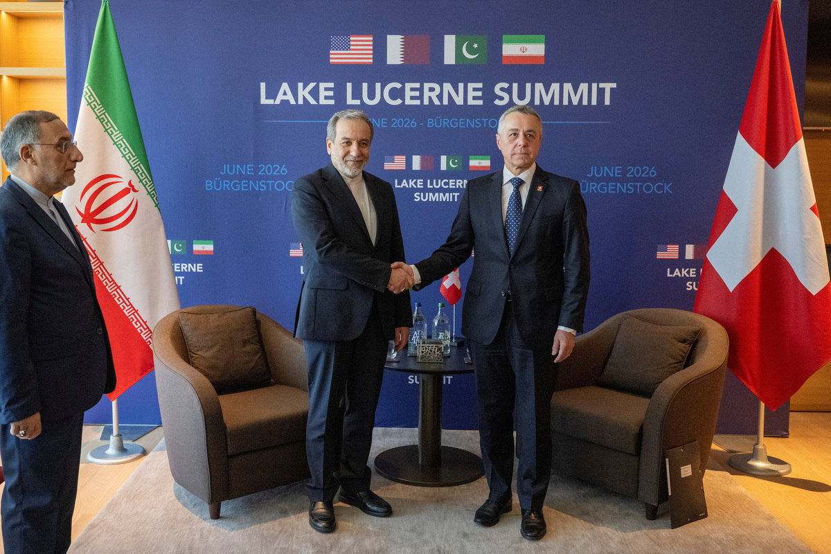 Minister of Foreign Affairs of Iran, Seyyed Abbas Araghchi, and Swiss Federal Council member, Ignazio Cassis, right, at bilateral discussions at the Burgenstock resort in Obburgen, near Lucerne, Switzerland, Sunday, June 21, 2026. URS FLUEELER/Pool via REUTERS