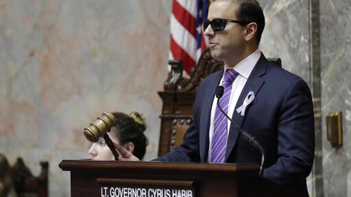 FILE - In this Jan. 30, 2019 file photo, Washington Lt. Gov. Cyrus Habib presides over the Senate at the Capitol in Olympia, Wash. Habib announced on Thursday, March 19, 2020, that he is not running for re-election and will join the Jesuit order of the Catholic Church as he starts the process of becoming a priest.