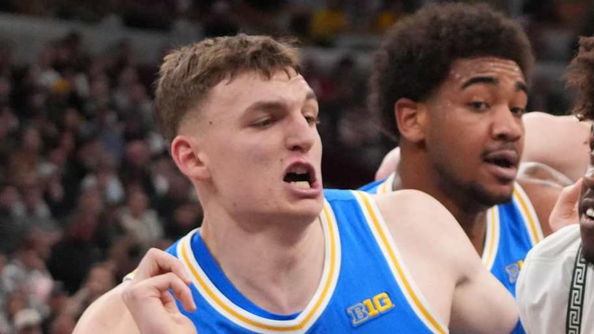  Mar 13, 2026; Chicago, IL, USA; UCLA Bruins guard Eric Freeny (8) forward Tyler Bilodeau (34) defends Michigan State Spartans forward Coen Carr (55) during the first half at United Center. Mandatory Credit: David Banks-Imagn Images | David Banks-Imagn Images 