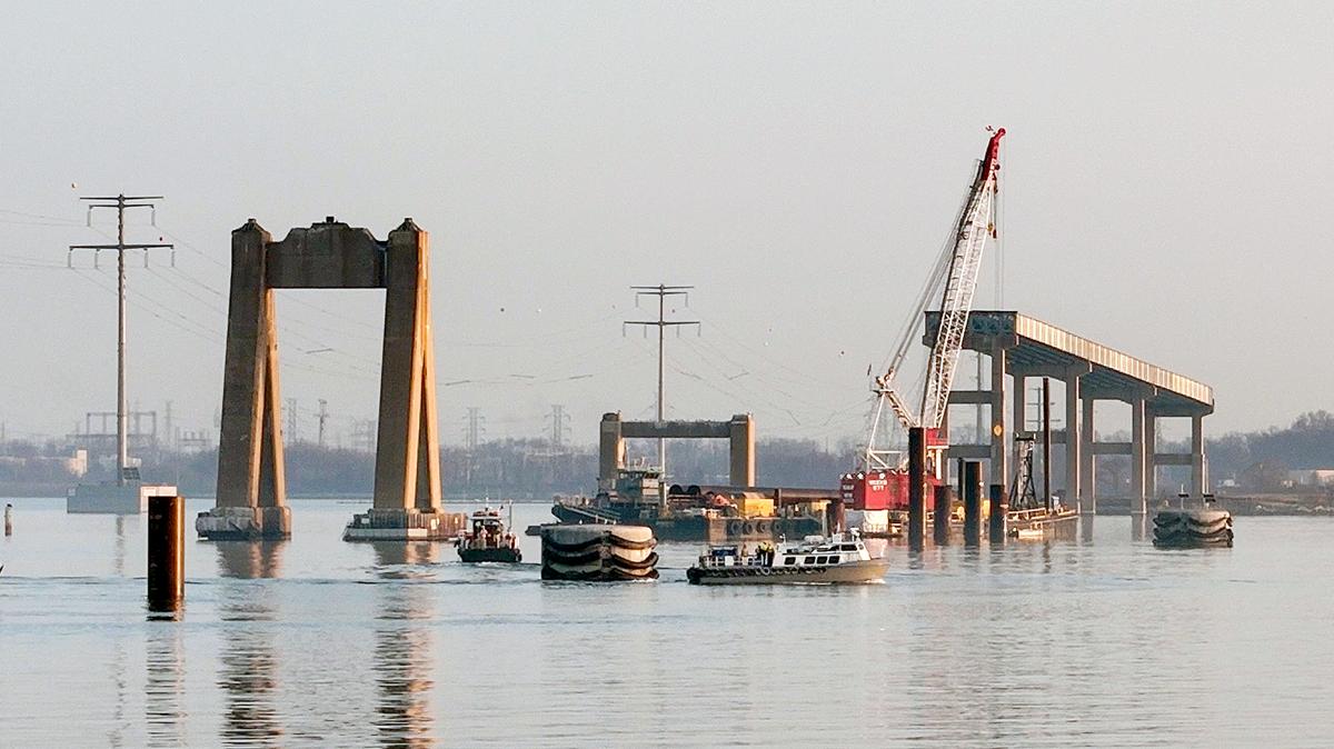 Workers continue repairs on the Francis Scott Key Bridge, including demolition of the old structure and planning and construction of a new, taller, stronger cable-stayed bridge. (Kevin Richardson/Baltimore Sun/TNS)