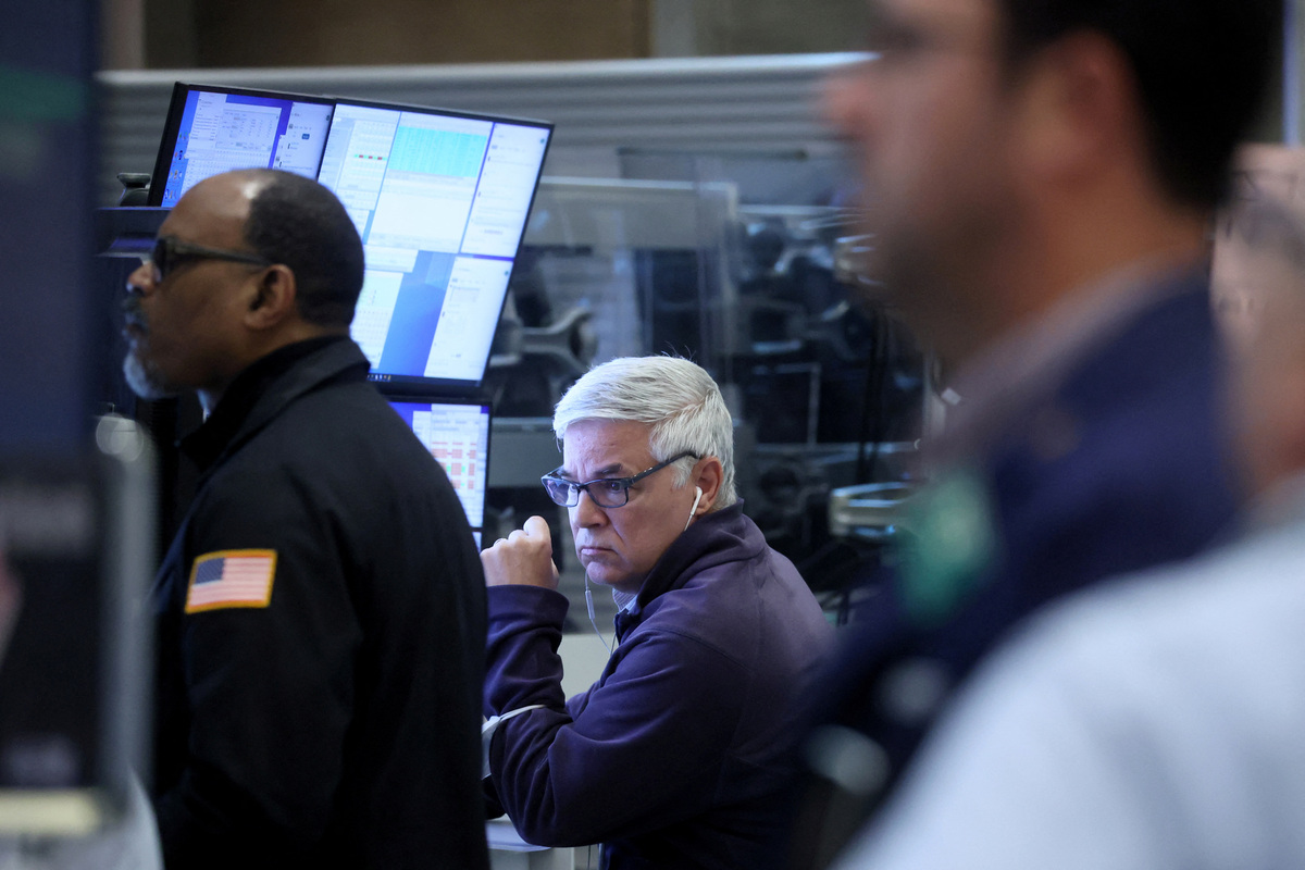 Options floor brokers work on the floor of the NYSE American, formerly known as the American Stock Exchange (AMEX) at New York Stock Exchange (NYSE) in New York City, U.S., May 10, 2023.  REUTERS/Brendan McDermid