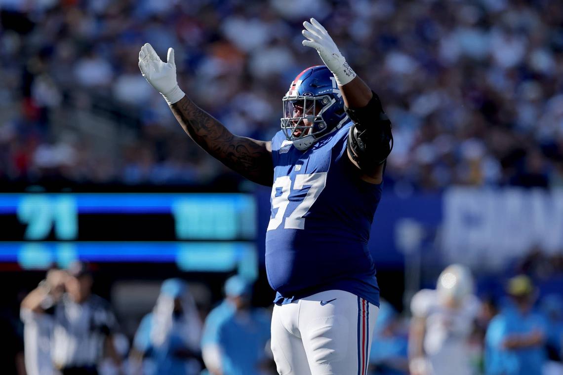  Sep 28, 2025; East Rutherford, New Jersey, USA; New York Giants defensive tackle Dexter Lawrence (97) reacts during the fourth quarter against the Los Angeles Chargers at MetLife Stadium. Mandatory Credit: Brad Penner-Imagn Images 