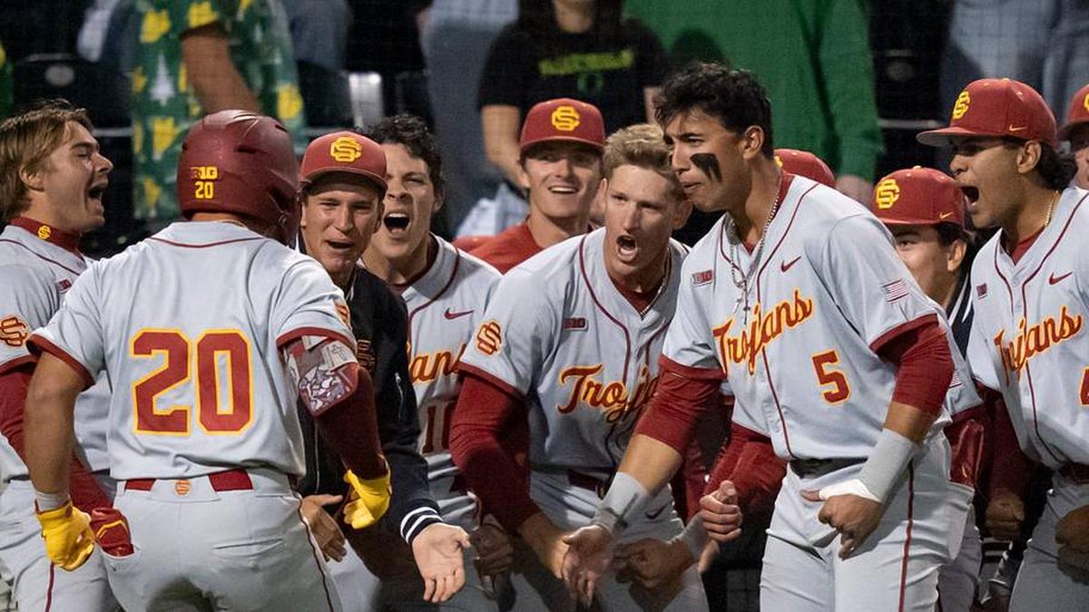  USC celebrates a home run by Isaac Cadena (20) as the Oregon Ducks host the USC Trojans on May 14, 2026, in Eugene, Oregon. | Ben Lonergan/The Register-Guard / USA TODAY NETWORK via Imagn Images 