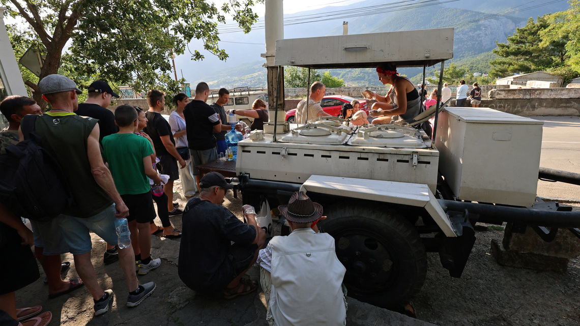 Crimean families queue for hot meals as Ukraine hits power supply 