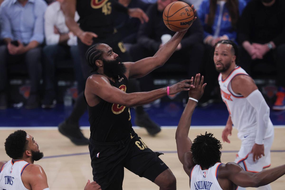  May 19, 2026; New York, New York, USA; Cleveland Cavaliers guard James Harden (1) drives to the basket against New York Knicks center Karl-Anthony Towns (32), forward Og Anunoby (8), and guard Jalen Brunson (11) during the first quarter of game one of the eastern conference finals during the 2026 NBA playoffs at Madison Square Garden. Mandatory Credit: Brad Penner-Imagn Images 