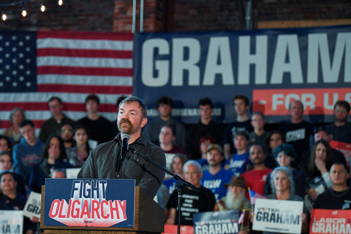 FILE PHOTO: Graham Platner, Democratic candidate for U.S. Senate in Maine, speaks during a "Fighting Oligarchy" campaign rally with U.S. Senator Bernie Sanders (I-VT) in Portland, Maine, U.S., May 25, 2026.   REUTERS/Amanda Sabga/File Photo