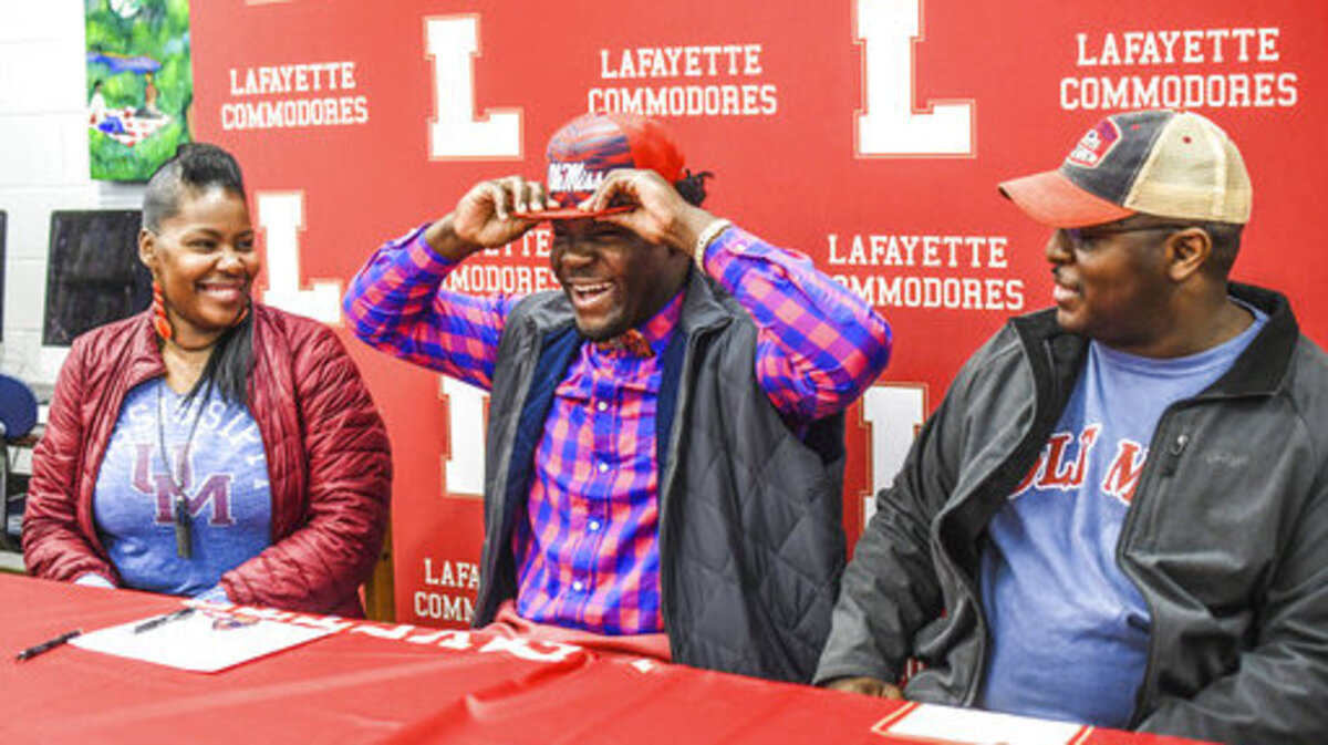 High school football players can officially sign letters of intent during the early signing period on Wednesday Dec. 21, 2022. (Bruce Newman, Oxford Eagle via AP)