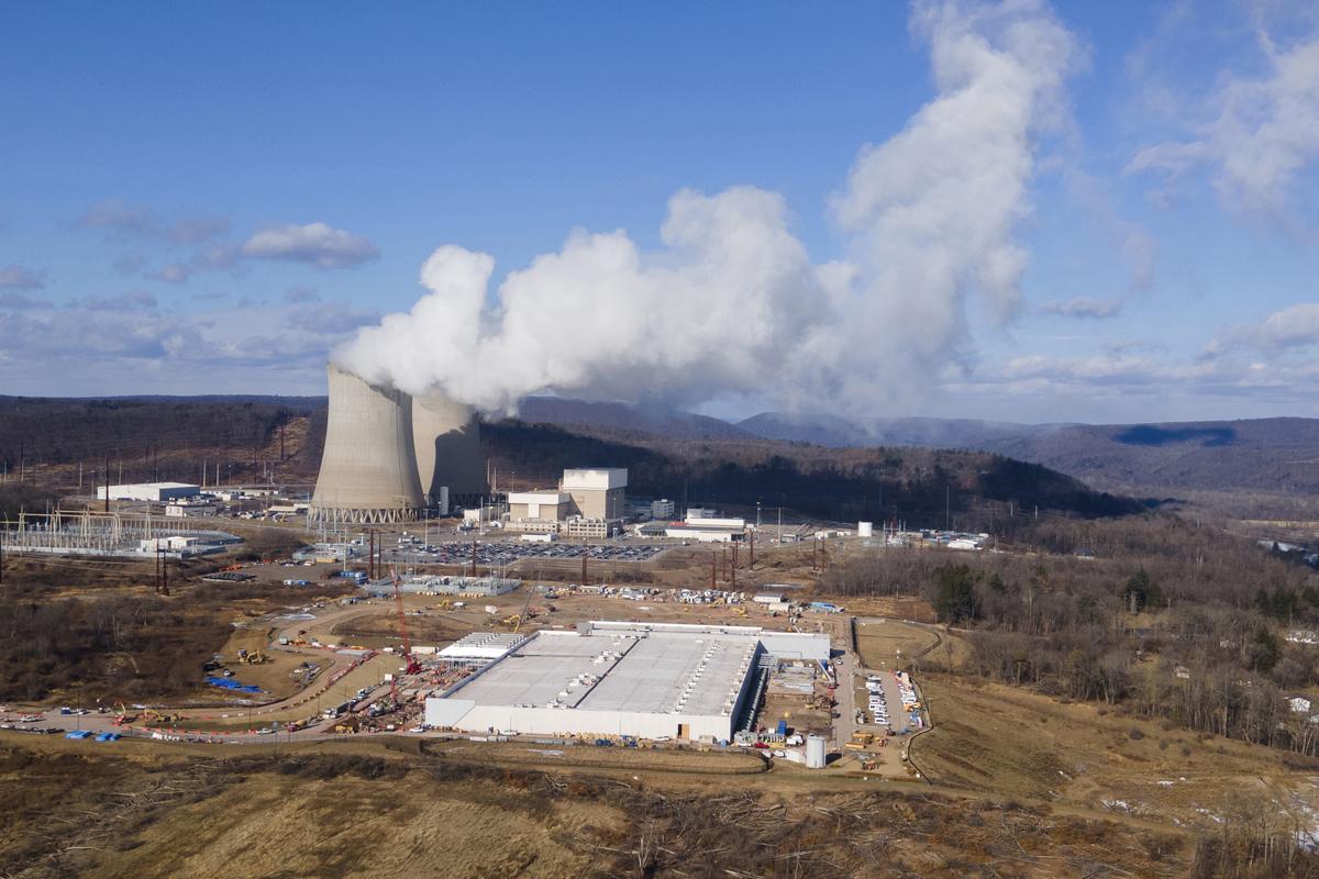  A data center owned by Amazon Web Services, front, under construction next to the Susquehanna nuclear power plant in Berwick, Pennsylvania, in January 2025. 
