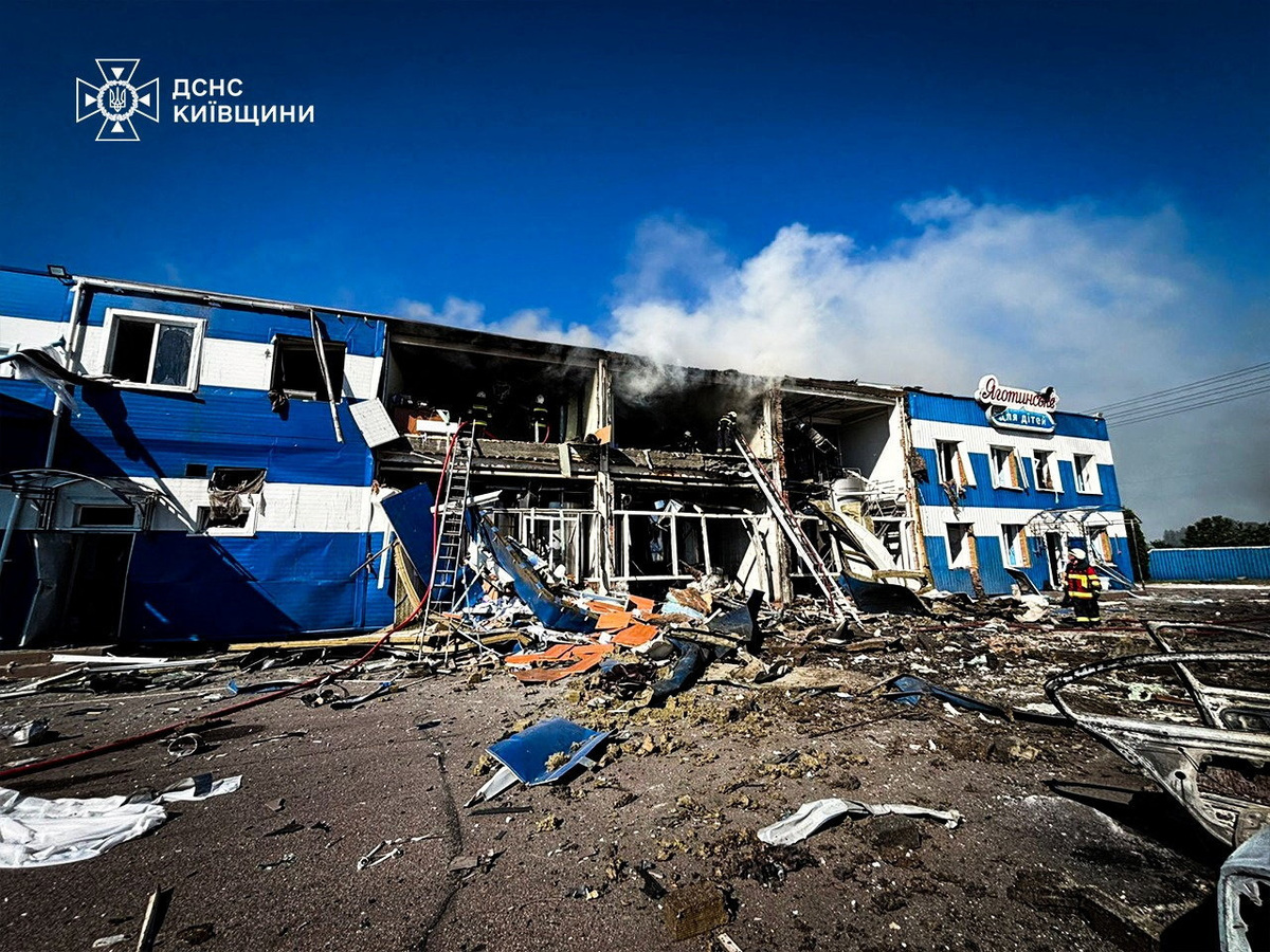 Rescuers work at a site of a dairy plant hit by a Russian drone strike, amid Russia's attack on Ukraine, in Kyiv region, Ukraine in this handout picture released June 5, 2026. Press service of the State Emergency Service of Ukraine in Kyiv region/Handout via REUTERS