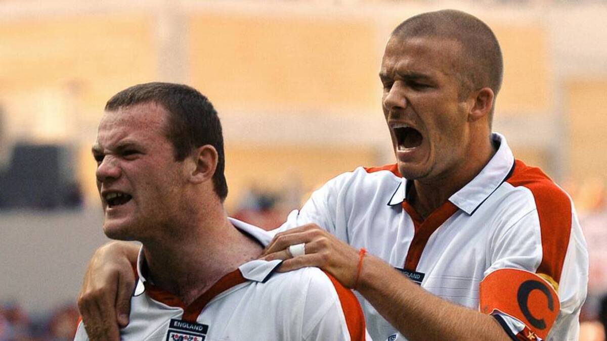 Along with David Beckham (right), Wayne Rooney ushered in England's "Golden Generation." | PAUL BARKER/AFP/Getty Images 