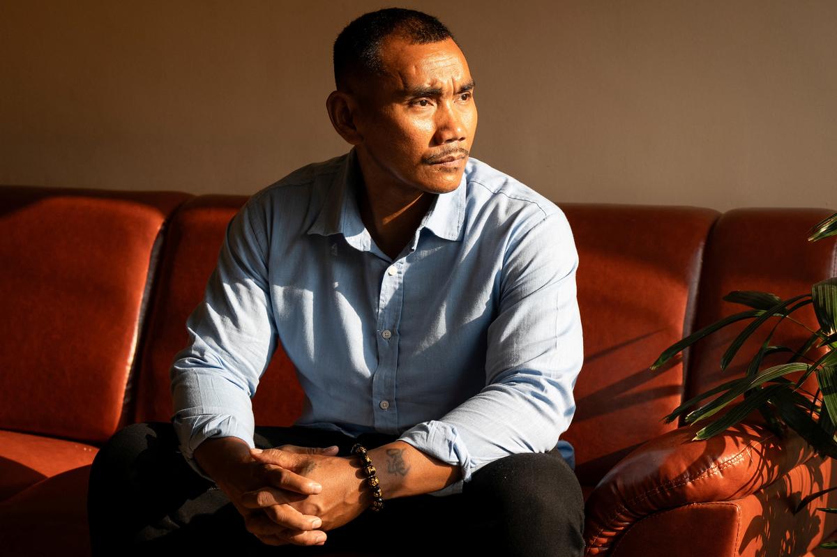 FILE PHOTO: Pheap Rom, a Cambodian refugee and former U.S. resident, looks on during an interview with Reuters following his repatriation from Eswatini, in Phnom Penh, Cambodia, April 7, 2026. REUTERS/Roun Ry/File Photo