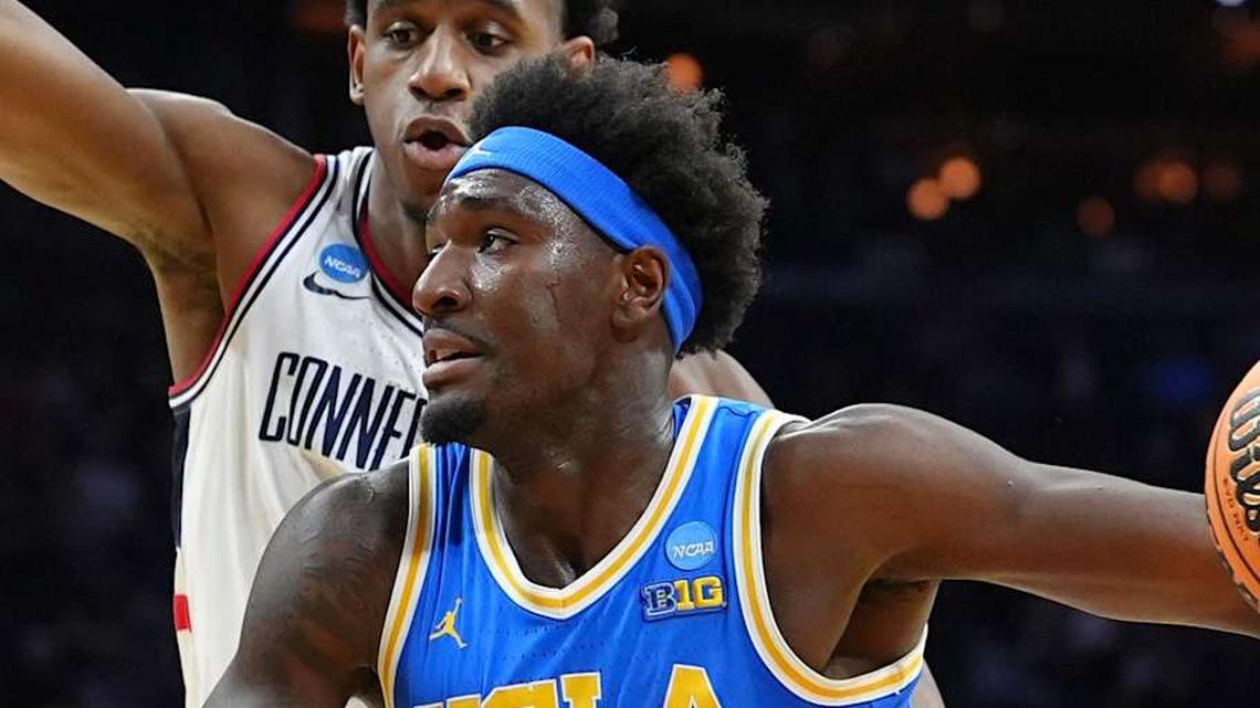  Mar 22, 2026; Philadelphia, PA, USA; UCLA Bruins forward Eric Dailey Jr. (3) dribbles the ball against the UConn Huskies in the first half during a second round game of the men's 2026 NCAA Tournament at Xfinity Mobile Arena. Mandatory Credit: Kyle Ross-Imagn Images | Kyle Ross-Imagn Images 