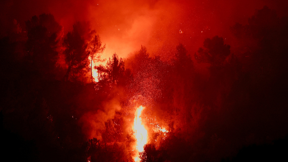 Wildfires rage in Greece as firefighters continue battle in France and Spain 
