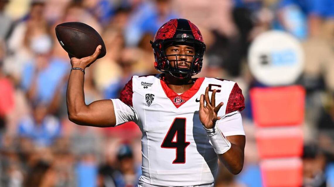 Who will start at quarterback for San Diego State against Fresno State?