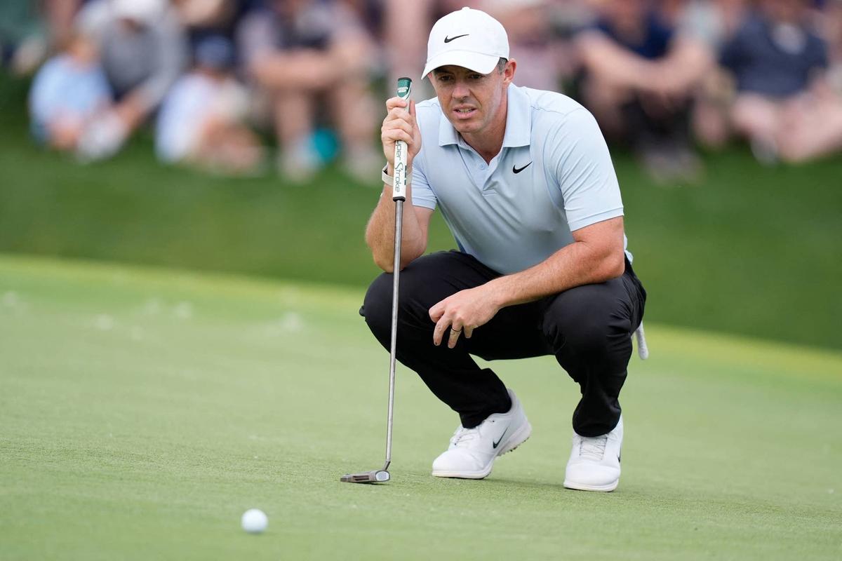  Rory McIlroy eyes his line on the 18th green during the second round of the Truist Championship in Charlotte, North Carolina, on May 8, 2026. Jim Dedmon-Imagn Images