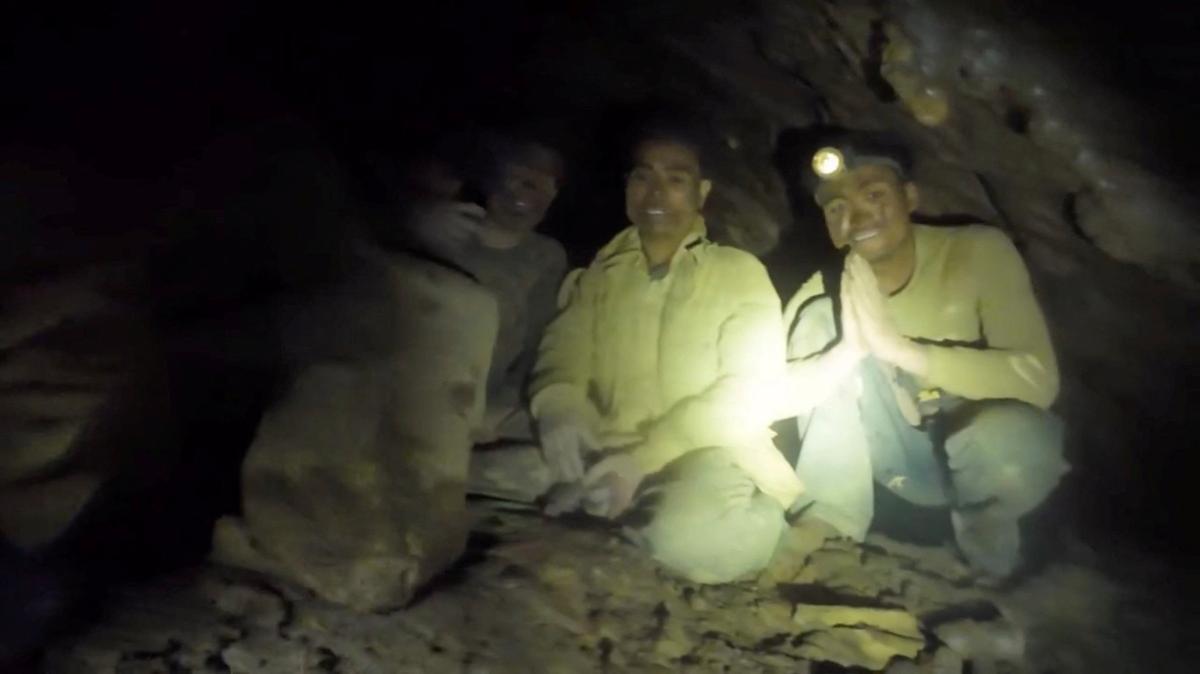 People trapped in a cave are found alive by rescue workers in Xaisomboun Province, Laos, May 27, 2026, in this screengrab obtained from a social media video. Norrased Palasing/via REUTERS