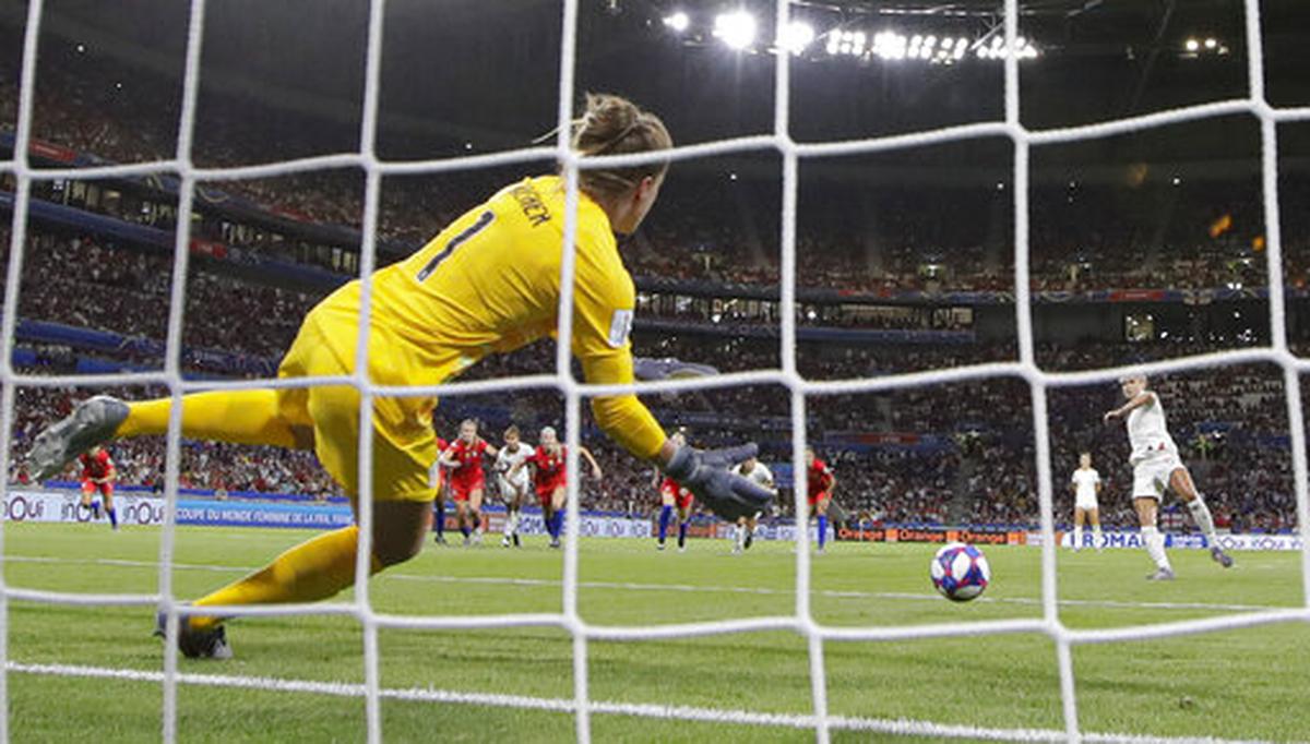 United States goalkeeper Alyssa Naeher saves a penalty shot taken by England’s Steph Houghton during the Women’s World Cup semifinal soccer match between England and the United States, at the Stade de Lyon, outside Lyon, France, Tuesday, July 2, 2019.