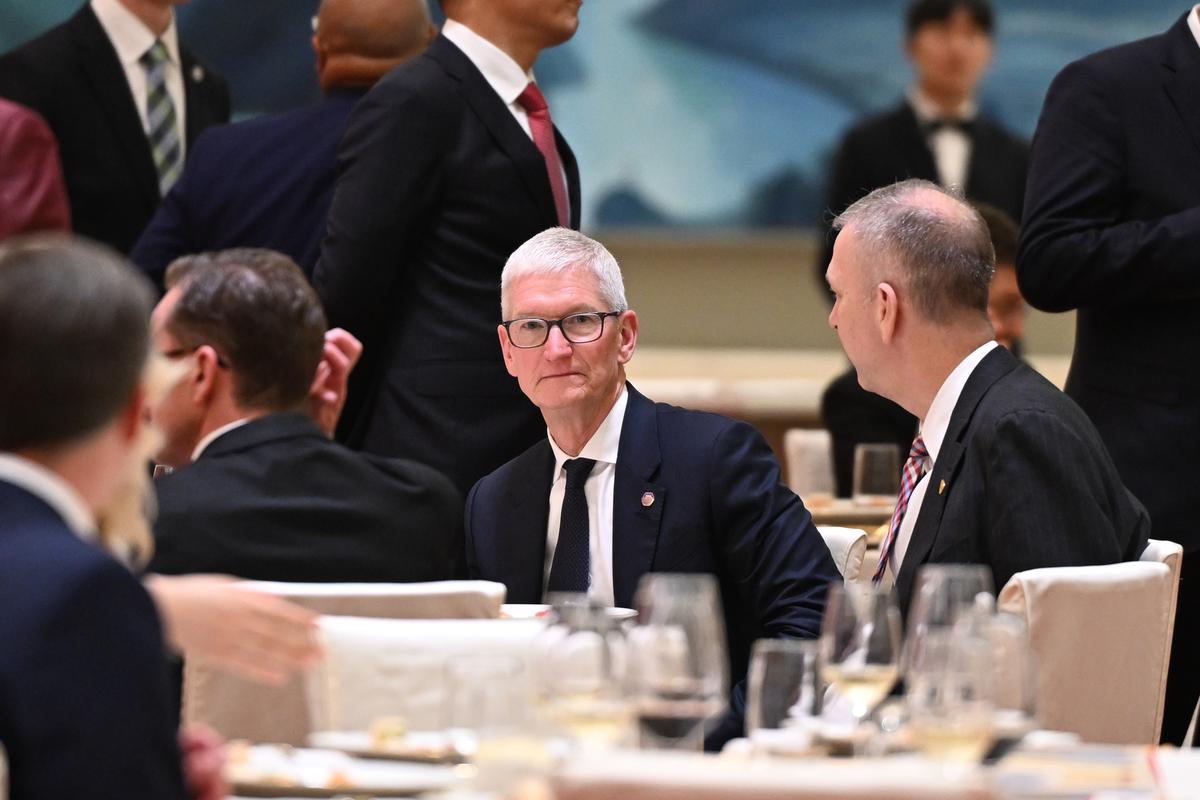 Tim Cook, the chief executive of Apple, attends a state banquet during the summit between President Donald Trump and President Xi Jinping of China, at the Great Hall of the People in Beijing on Thursday, May 14, 2026. During the first U.S. presidential visit to China in nearly a decade, Xi delivered a warning on Taiwan, saying that the issue, if handled poorly, could lead to conflict and "an extremely dangerous situation." (Kenny Holston/The New York Times)..