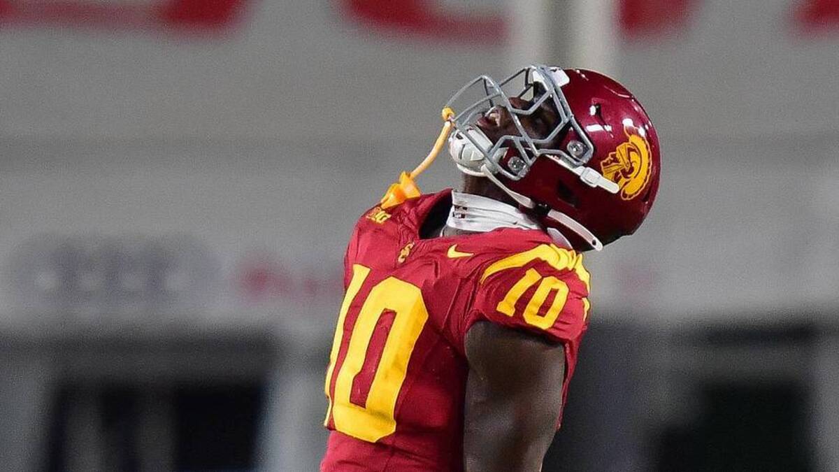  Sep 20, 2025; Los Angeles, California, USA; Southern California Trojans defensive end Braylan Shelby (10) reacts after bringing down Michigan State Spartans quarterback Aidan Chiles (2) during the first half at the Los Angeles Memorial Coliseum. Mandatory Credit: Gary A. Vasquez-Imagn Images | Gary A. Vasquez-Imagn Images 