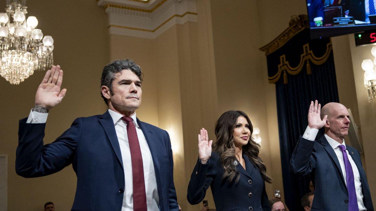 Director of the National Counterterrorism Center Joe Kent, left, U.S. Secretary of Homeland Security Kristi Noem and Operations Director of the National Security Branch at the FBI Michael Glasheen are sworn-in during a House Committee on Homeland Security hearing on Dec. 11. Kent posted his resignation on X.