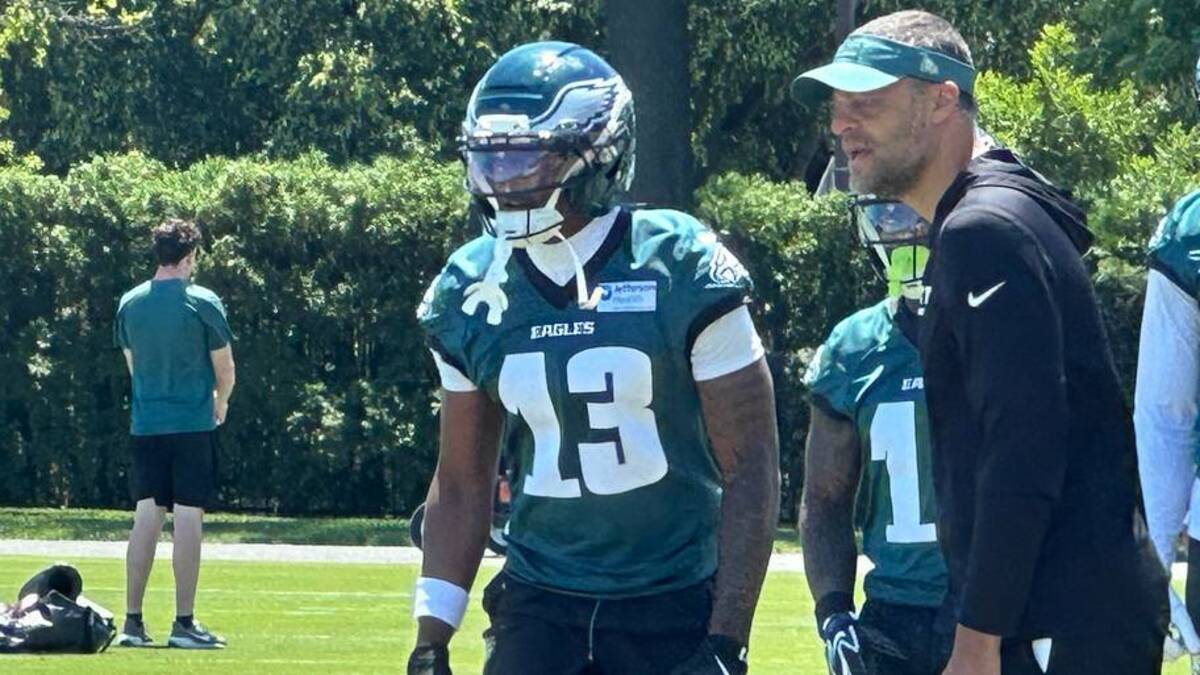  Eagles WR Dontayvion Wicks at Eagles' OTA practice with position coach Aaron Moorehead on June 2, 2026. | John McMullen/Eagles On SI 