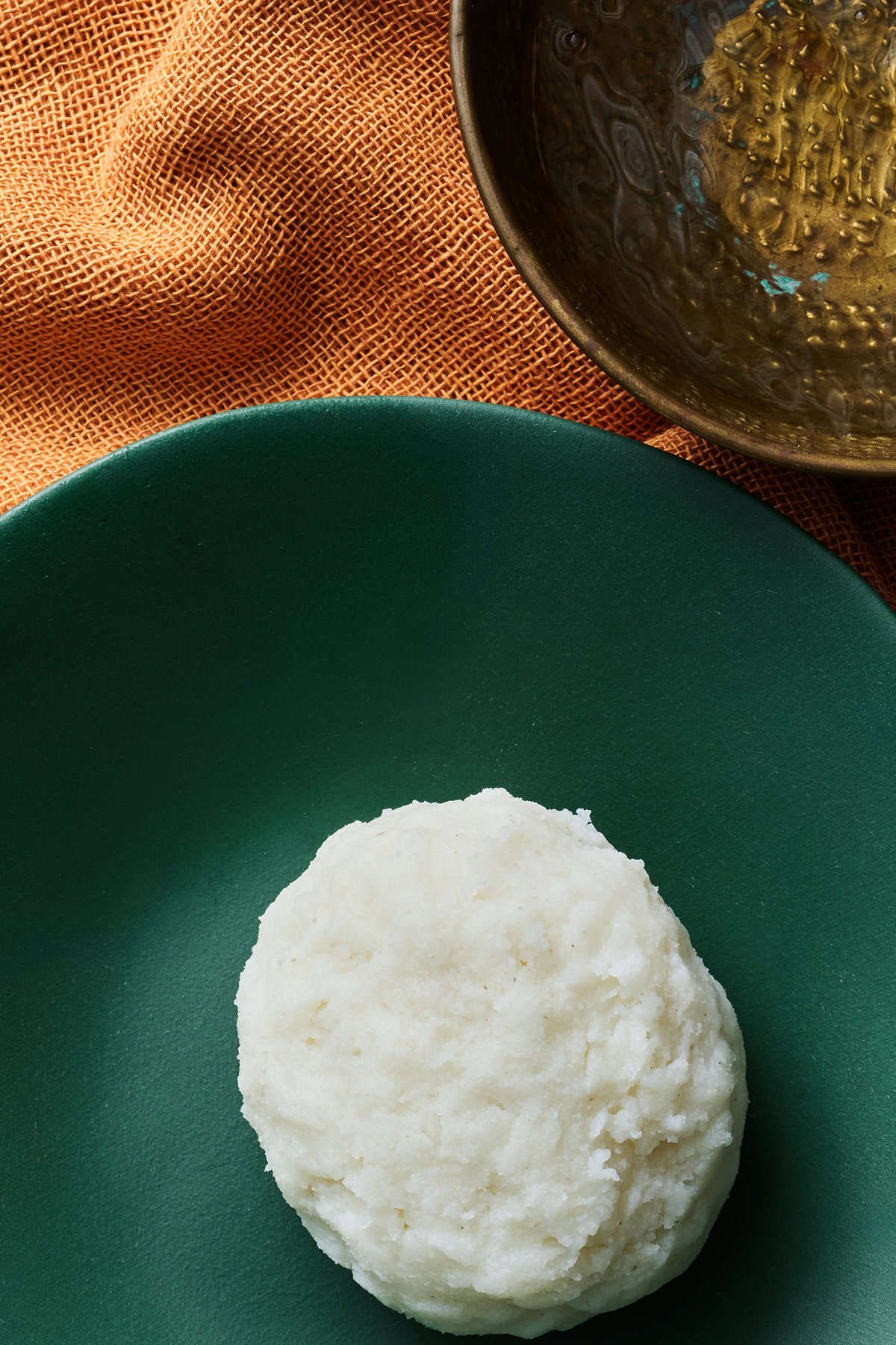 Masarepa can be an adequate substitute for the mahindi flour often used to make Ugali (White Corn Swallow). A versatile sidekick to soups and stews, swallows are full of possibility. That's what should keep you coming back, Yewande Komolafe writes. Food Stylist: Roscoe Betsill. Prop Stylist: Paige Hicks. (Kelly Marshall/The New York Times)