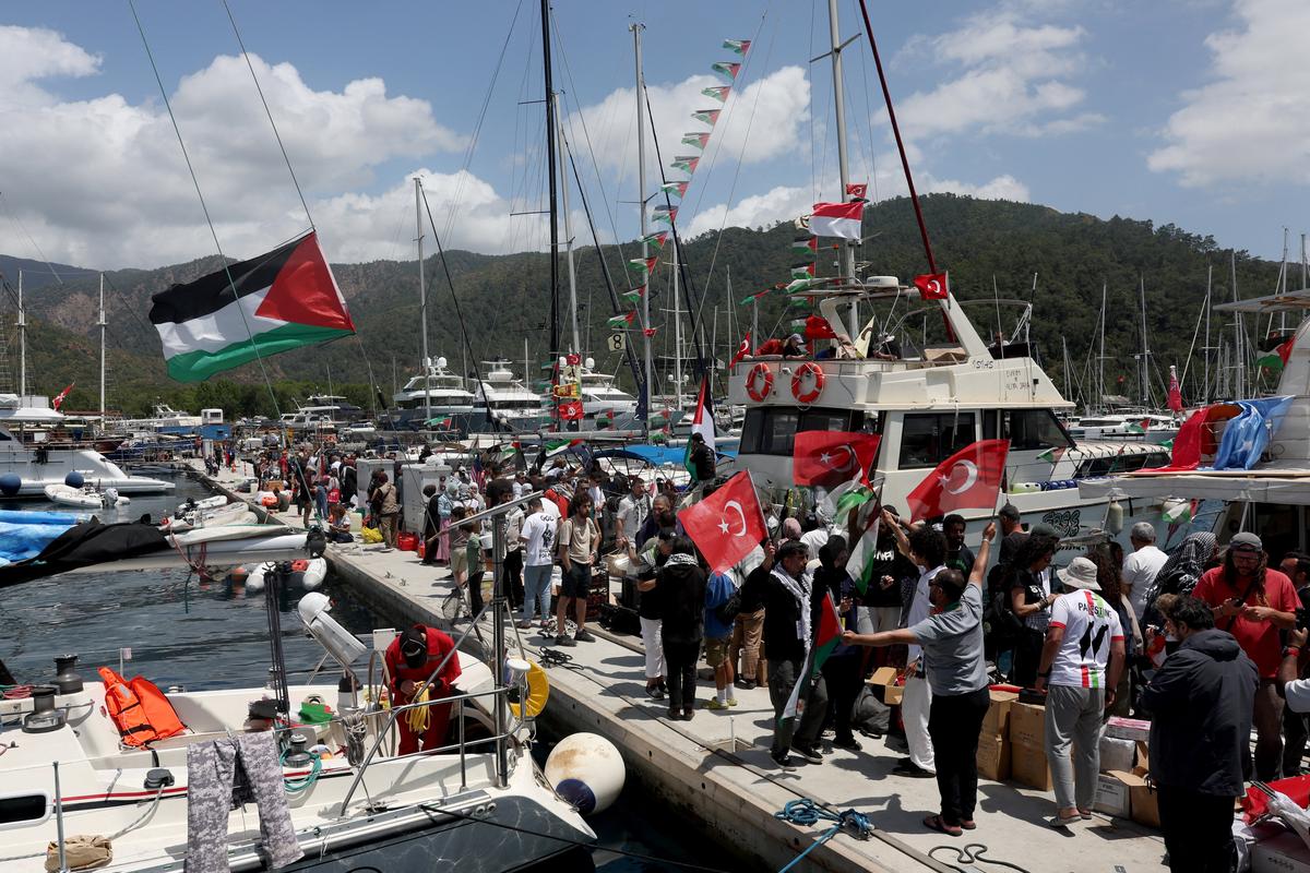 Activists from the Global Sumud Flotilla, aiming to reach Gaza and break Israel’s naval blockade, gather at a port before their departure in the southern Turkish resort of Marmaris, Turkey, May 14, 2026. REUTERS/Dilara Senkaya