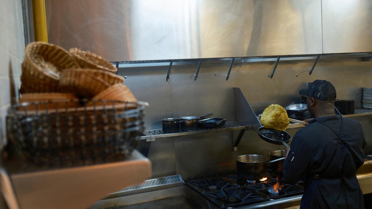 A chef prepares food at Lila Molino restaurant, in Dubai, United Arab Emirates, April 28, 2026. REUTERS