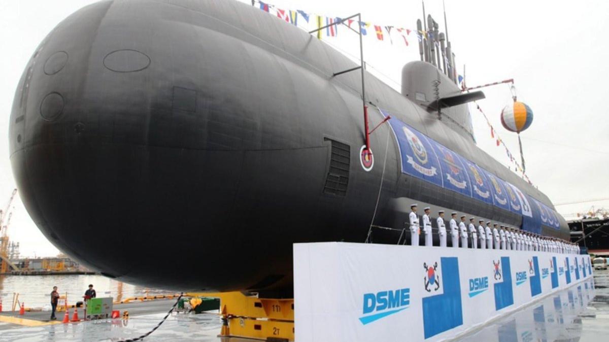Sailors attend a launching ceremony for the Dosan Ahn Chang-ho, South Korea's indigenous 3,000-ton submarine, at a shipyard on Geoje Island, South Korea. The submarine, named after a highly respected South Korean independence fighter, is the Navy's first homegrown mid-class underwater strategic weapons system. Photo by YONHAP / EPA