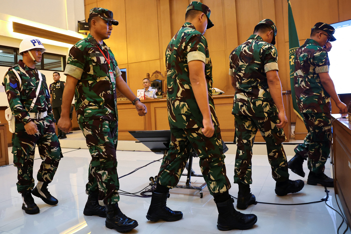 Indonesian military personnel Sami Lakka, Nandala Dwi Prasetya, Budhi Hariyanto Widhi Cahyono, and Edi Sudarko, leave the court room after they were found guilty on charges of serious premeditated assault in an acid attack on an activist known for campaigning against the growing role of the military Andrie Yunus, a ‌deputy coordinator with the Commission for Missing Persons and Victims of Violence, (KontraS), following their verdicts at the military court in Jakarta, Indonesia, June 10, 2026. REUTERS/Willy Kurniawan