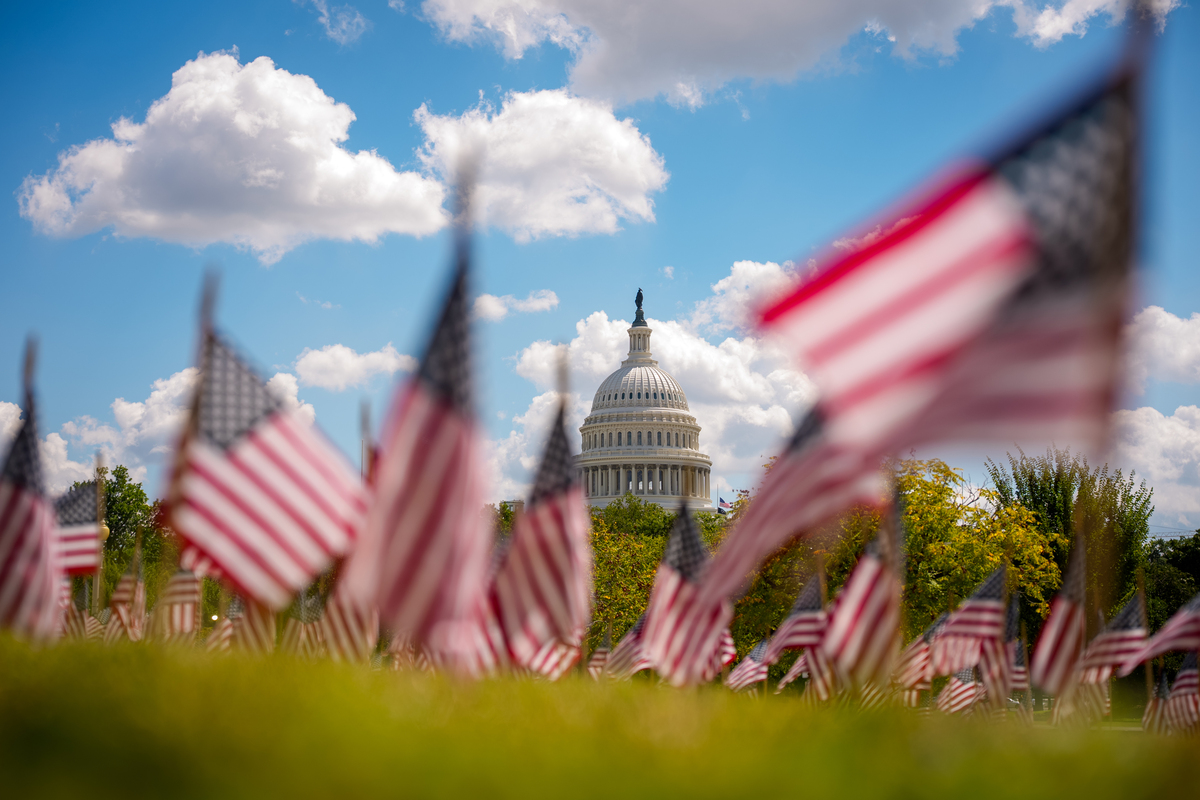 Hundreds of American flags are seen on the lawn in front of the U.S Department of Labor in Washington, D.C., on August 29, 2025.