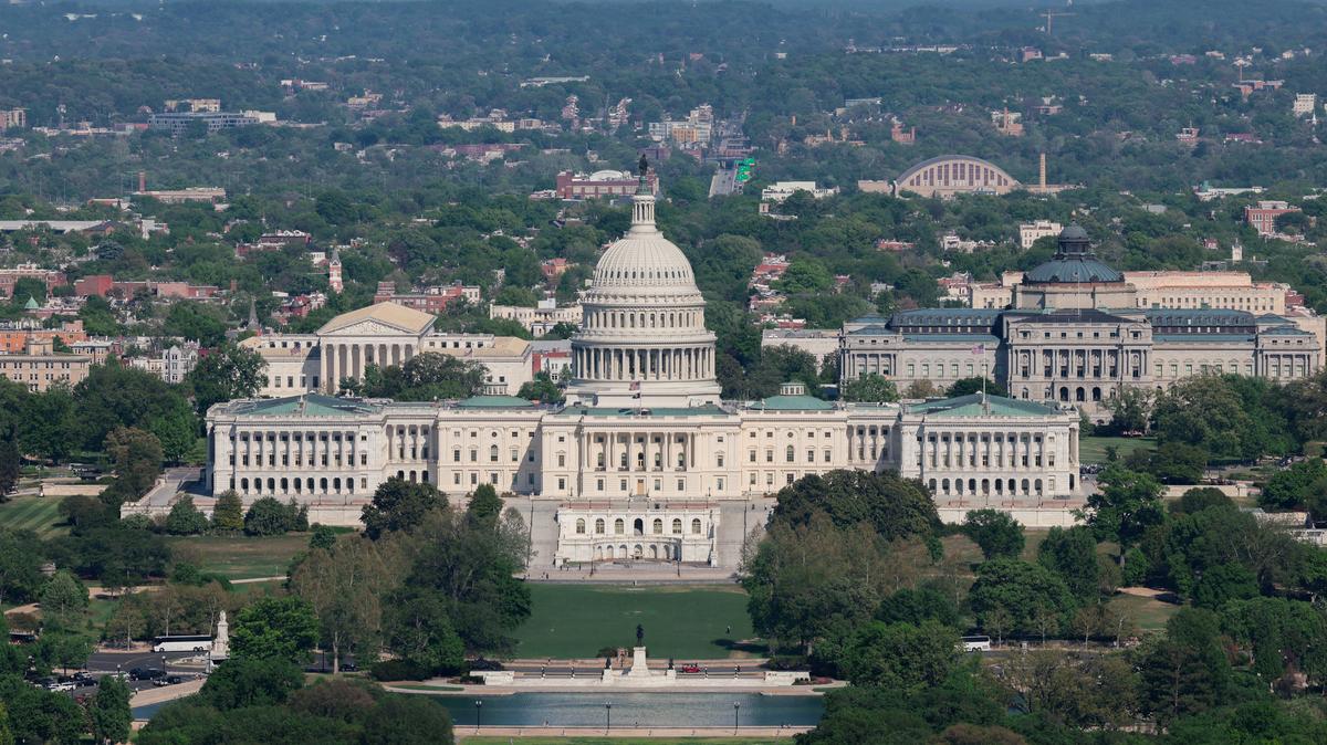 FILE PHOTO: The U.S. Capitol Building and Library of Congress in Washington, D.C., U.S., April 16, 2026. REUTERS/Kylie Cooper/File Photo/File Photo
