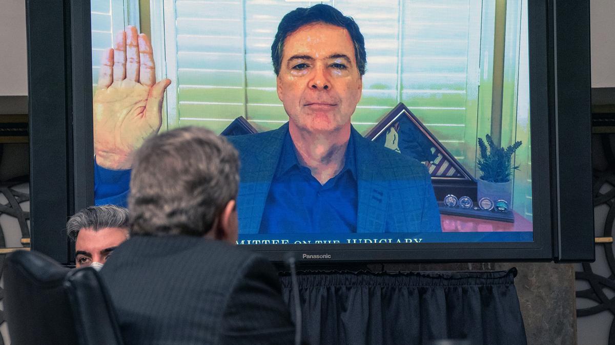 Sen. John Kennedy (R-LA) watches a monitor of James Comey, Former Director Of The Federal Bureau Of Investigation being sworn in before testifying remotely before a Senate Judiciary Committee hearing  in Washington, DC, on Sept. 30, 2020. The committee is exploring the Federal Bureau of Investigations investigation of the 2016 Trump campaign and Russian election interference. (Ken Cedeno/AFP/Getty Images/TNS)