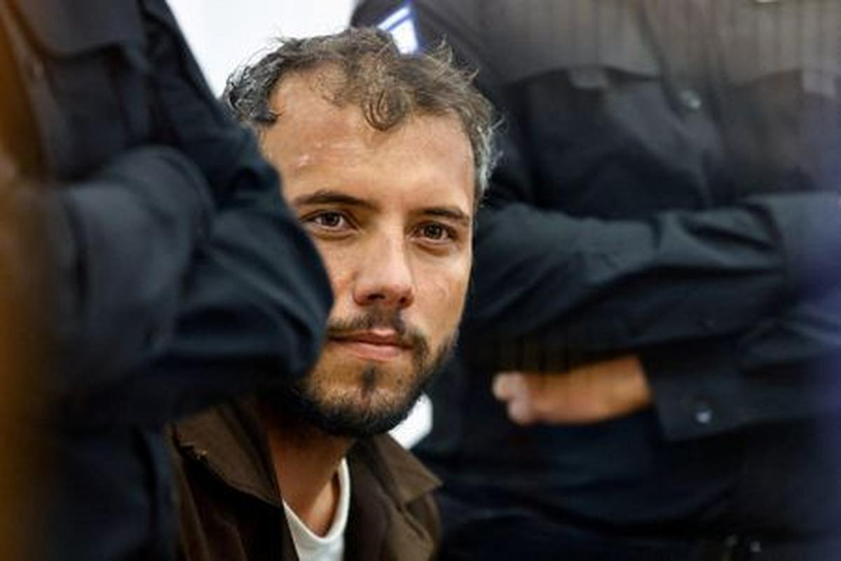 FILE PHOTO: Brazilian Activist Thiago Avila, who was detained aboard the Gaza-bound Global Sumud Flotilla, which was intercepted by Israeli forces in international waters, appears at a court in Beersheba, southern Israel May 6, 2026. REUTERS/Amir Cohen/File Photo