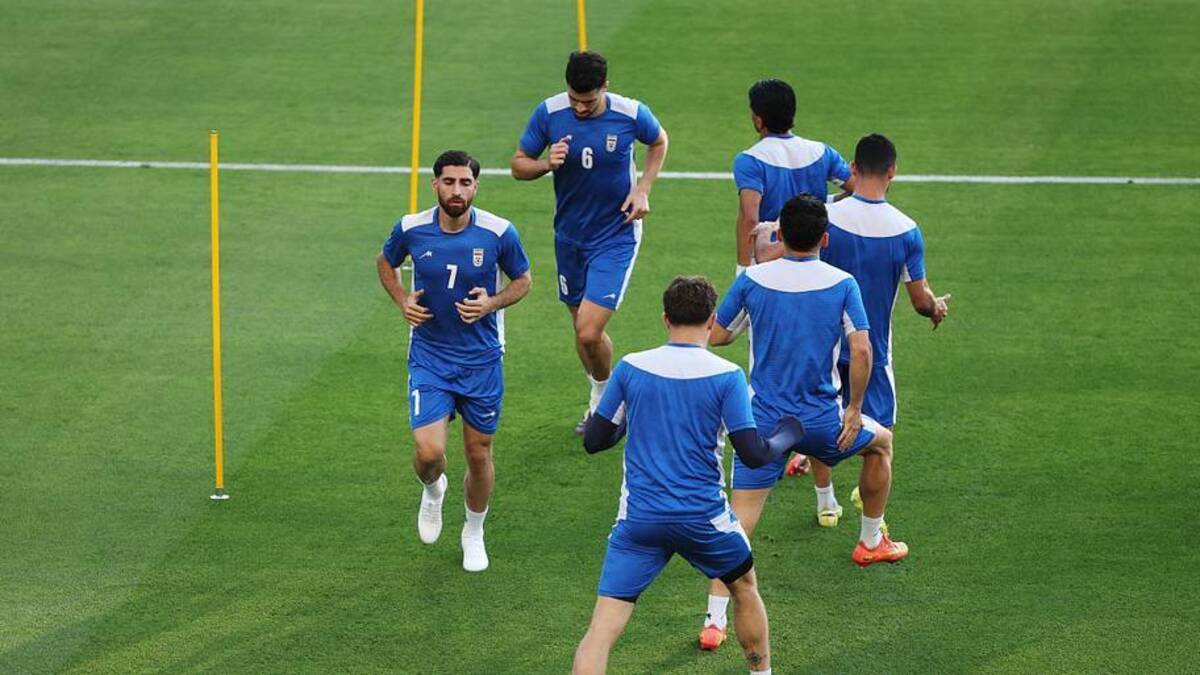  Iran faces off against New Zealand. | Harry How/Getty Images 