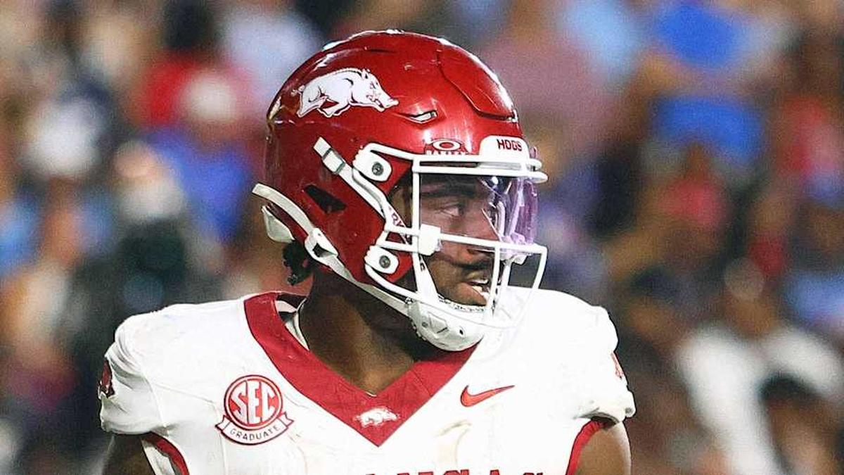  Sep 13, 2025; Oxford, Mississippi, USA; Arkansas Razorback running back Mike Washington Jr. (4) reacts after a touchdown during the fourth quarter against the Mississippi Rebels at Vaught-Hemingway Stadium. Mandatory Credit: Petre Thomas-Imagn Images | Petre Thomas-Imagn Images 