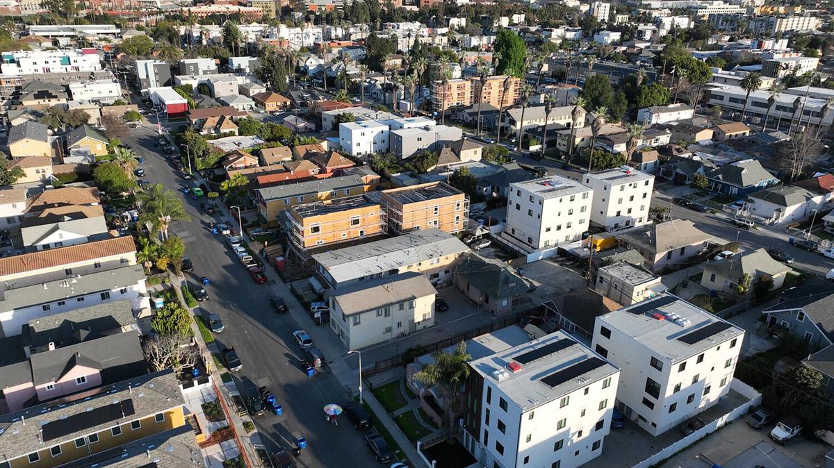 Aerial view of housing near USC in Los Angeles Tuesday, March 5, 2024. The neighborhood is changing west of USC that has historic bungalows next to new apartment buildings. Property investors are buying up old homes and putting in big apartment buildings. (Allen J. Schaben/Los Angeles Times/TNS)