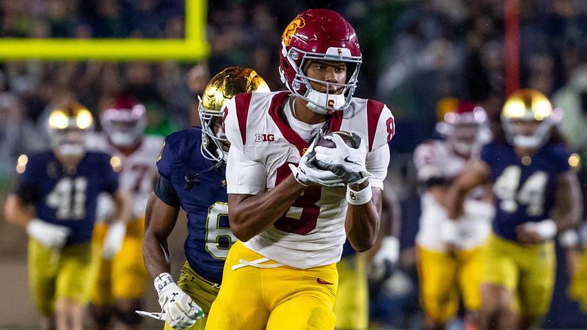  Oct 18, 2025; South Bend, Indiana, USA; Southern California Trojans wide receiver Ja'Kobi Lane (8) completes a reception against the Notre Dame Fighting Irish during the second half at Notre Dame Stadium. Mandatory Credit: Michael Caterina-Imagn Images | Michael Caterina-Imagn Images 