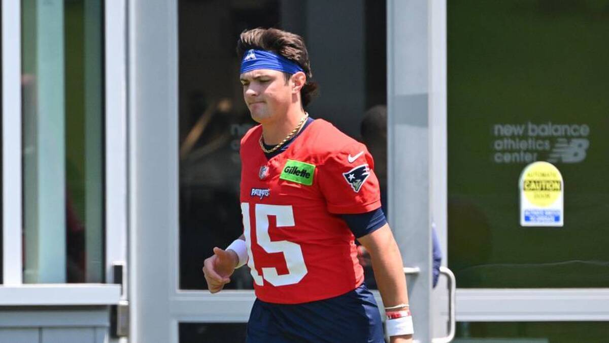  Jun 10, 2026; Foxborough, MA, USA; New England Patriots quarterback Behren Morton (15) arrives at the practice field for minicamp at Gillette Stadium. Mandatory Credit: Eric Canha-Imagn Images | Eric Canha-Imagn Images 