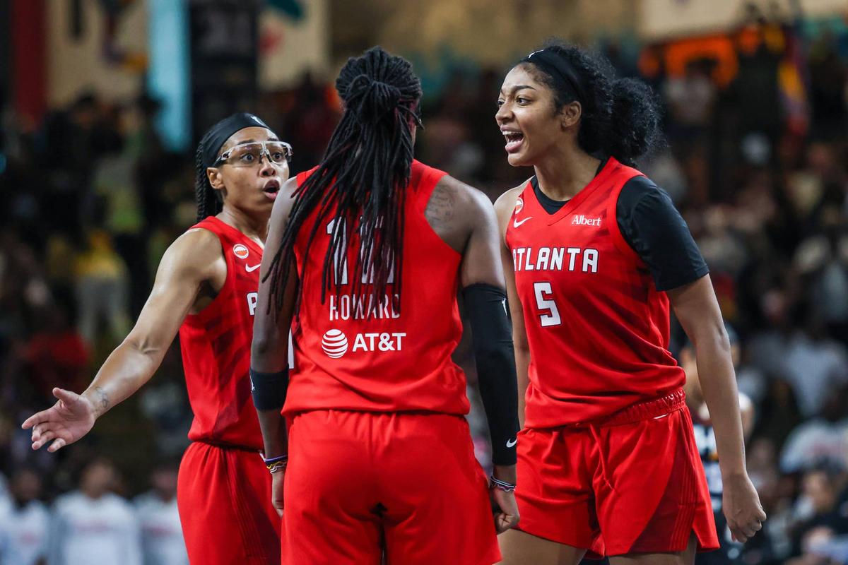  Atlanta Dream's Allisha Gray, Rhyne Howard and Angel Reese talk during deadball vs the Phoenix Mercury Jordan Godfree-Imagn Images