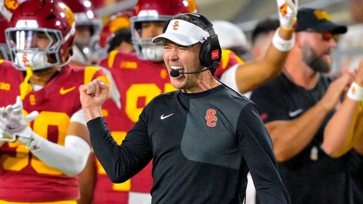  Oct 11, 2025; Los Angeles, California, USA; USC Trojans head coach Lincoln Riley celebrates after kicker Ryon Sayeri (48) hit a 54-yard field goal in the second half against the Michigan Wolverines at United Airlines Field at the Los Angeles Memorial Coliseum. Mandatory Credit: Jayne Kamin-Oncea-Imagn Images | IMAGN IMAGES via Reuters Connect 