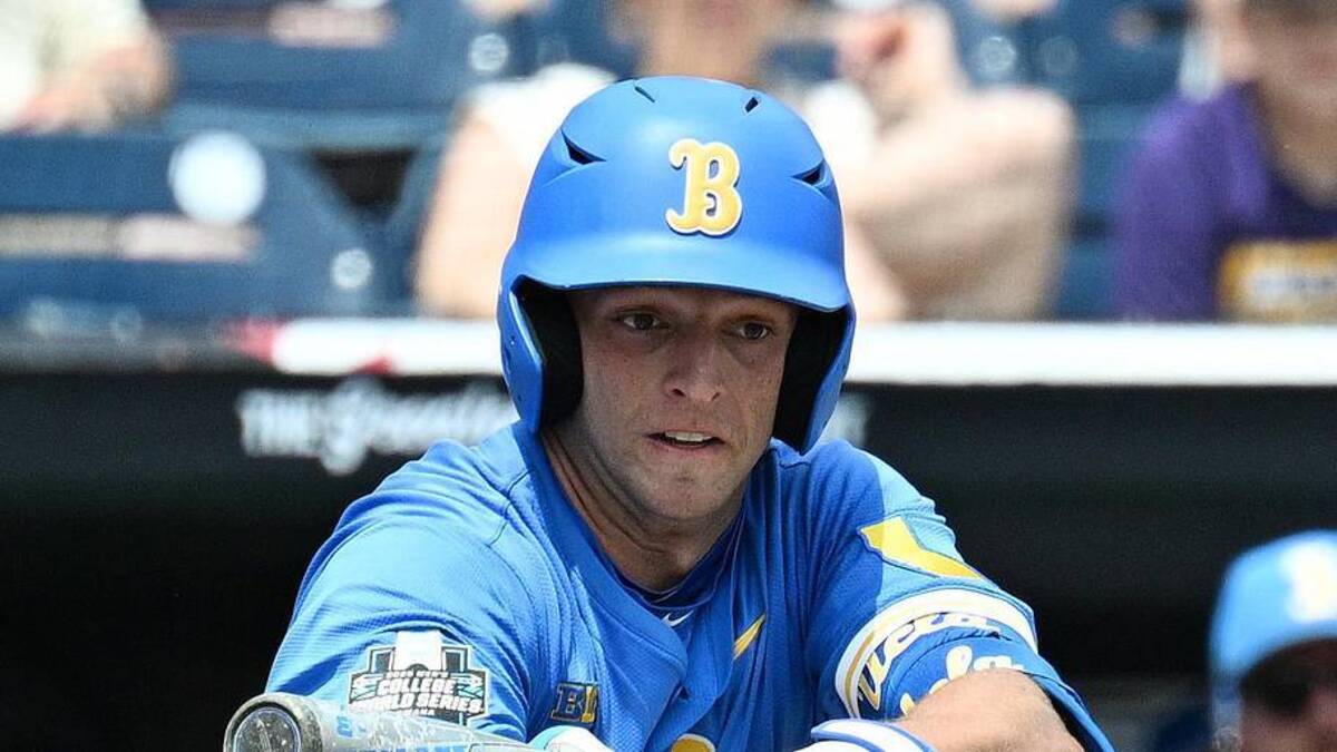  Jun 14, 2025; Omaha, Neb, USA; UCLA Bruins shortstop Roch Cholowsky (1) bunts in a run against the Murray State Racers during the fourth inning at Charles Schwab Field. Mandatory Credit: Steven Branscombe-Imagn Images | Steven Branscombe-Imagn Images 