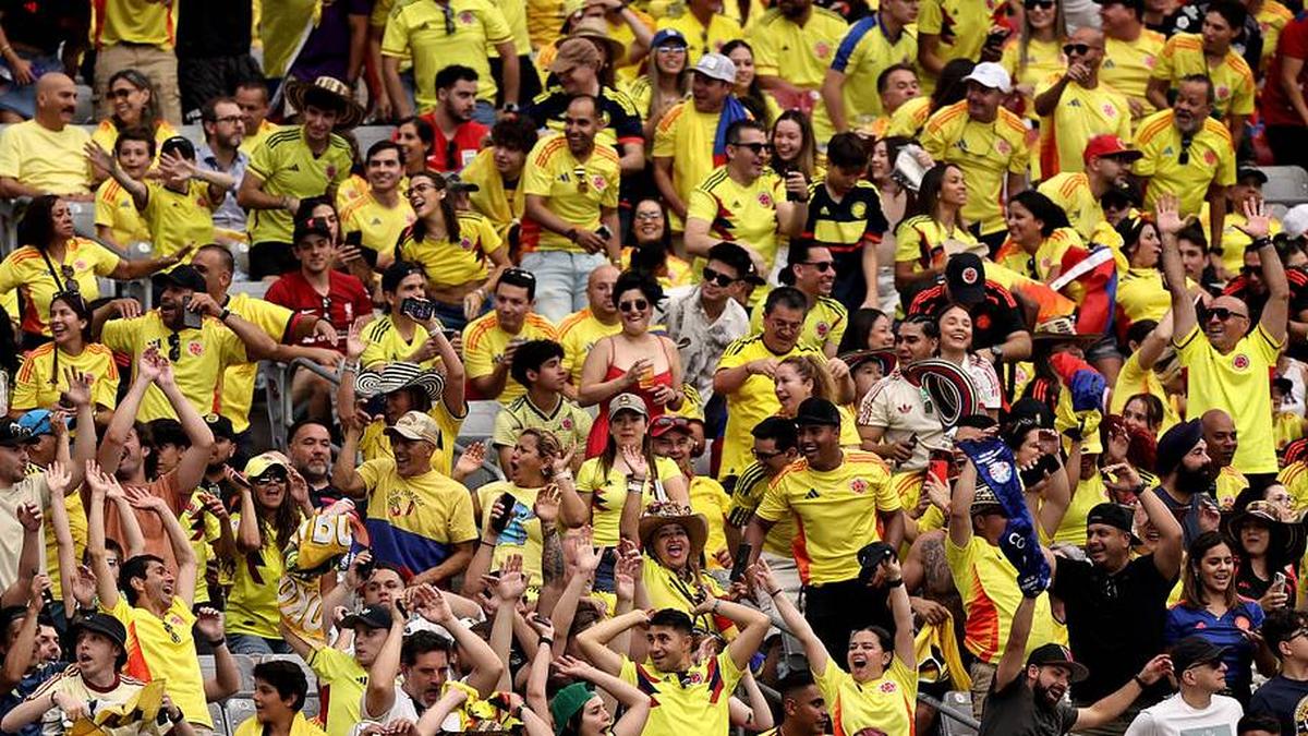 Colombia fans are a sea of yellow in stadiums across the globe. | Omar Vega/Getty Images 