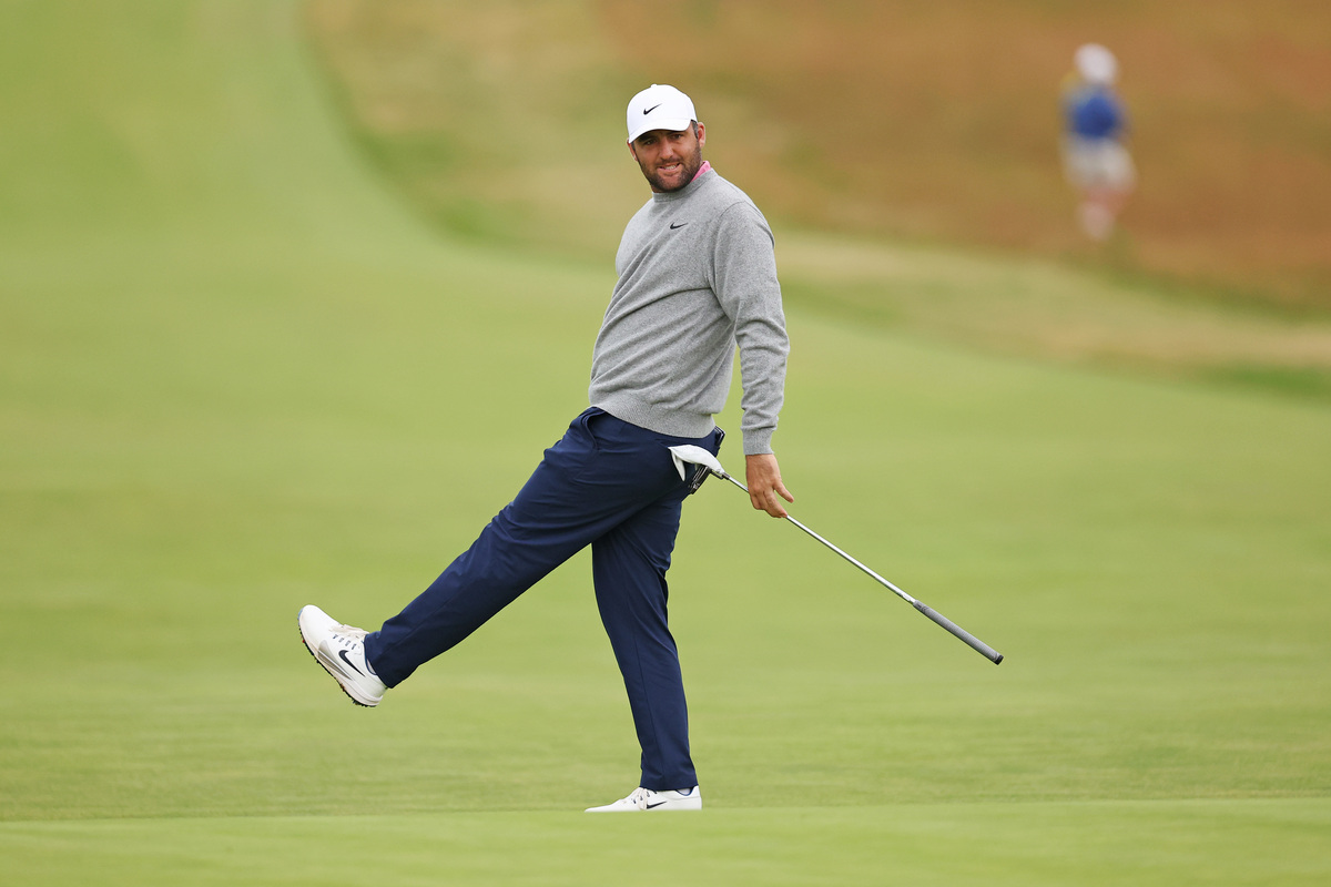Jun 18, 2026; Southampton, New York, USA; Scottie Scheffler reacts to his putt on the second hole during the first round of the U.S. Open golf tournament. Mandatory Credit: Bill Streicher-Imagn Images