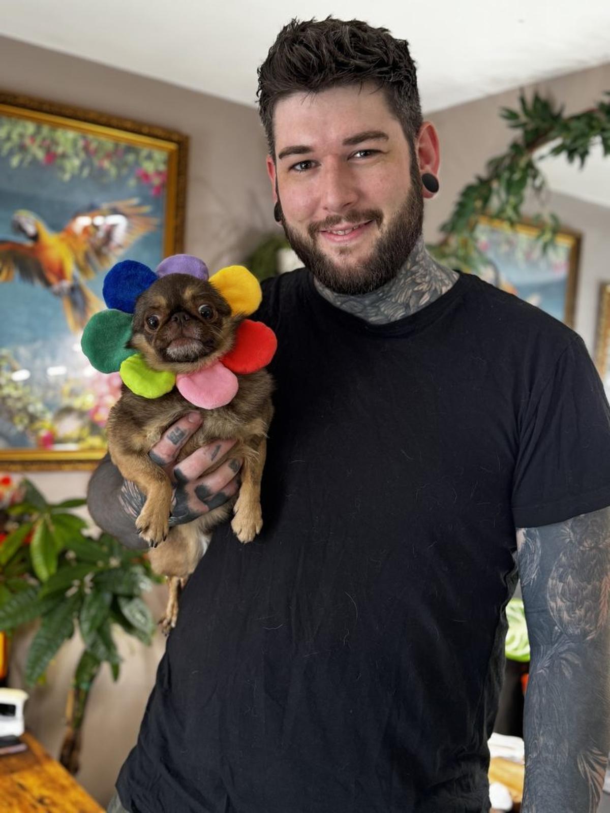  Chilli The Pug with owner Oliver. (kingchillithepug via SWNS) 